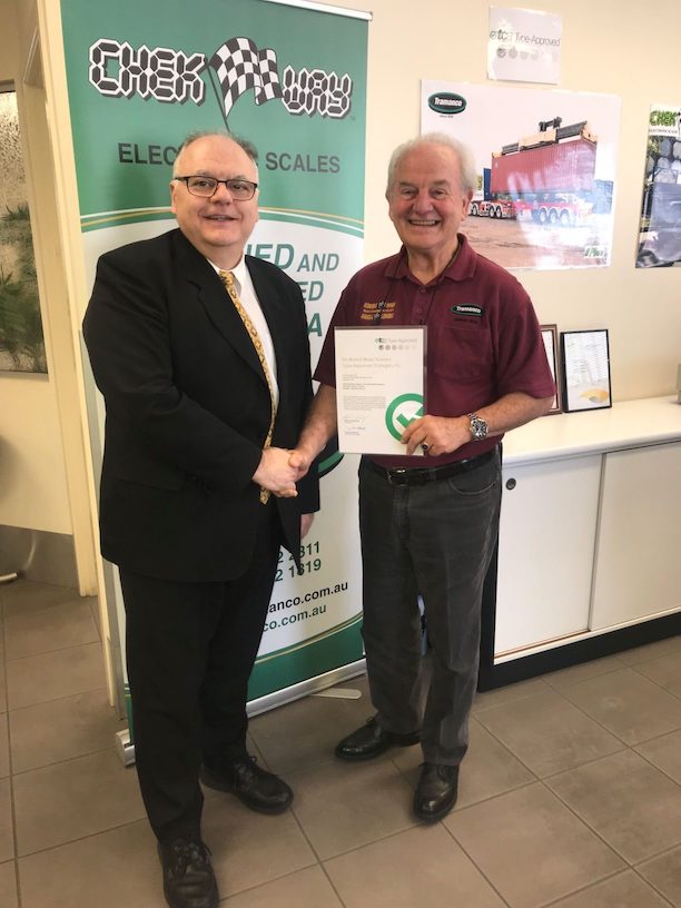 Chris Koniditsiotis congratulates Roger Sack TCA awarding Type Approval to Tramanco